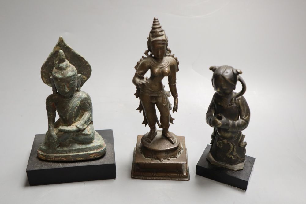 An Asian bronze Buddha, Ming bronze figure fragment and an Indian bronze figure, a hardstone cup, soapstone seals etc, tallest 15.5cm